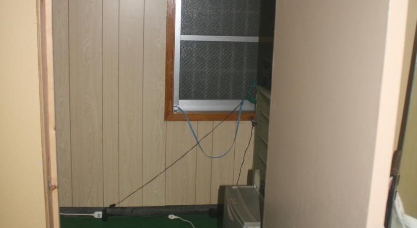 Koza Share House Hotel Okinawa Szoba fotó